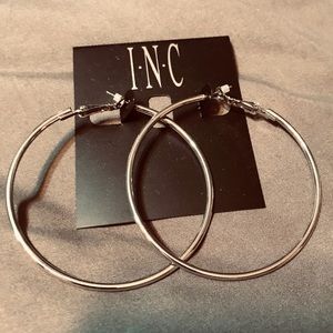 Large silver INC hoop earrings